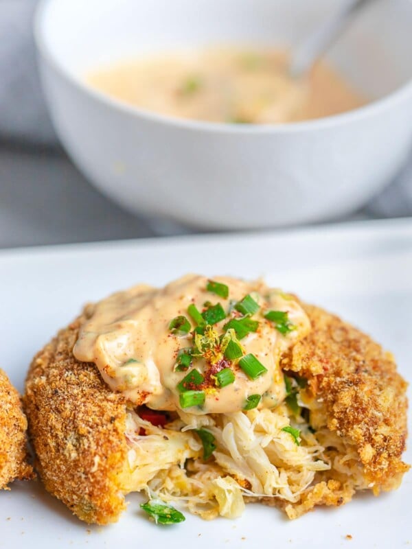 Baked Crab Cakes with Remoulade Sauce on white plate