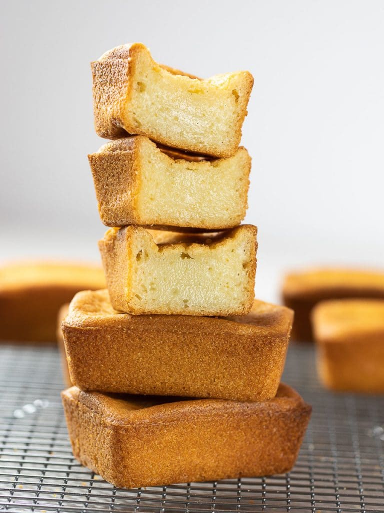 butter mochi stacked on top of a wire rack