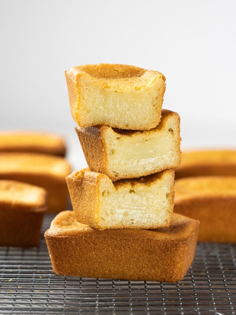 butter mochi stacked on top of a wire rack