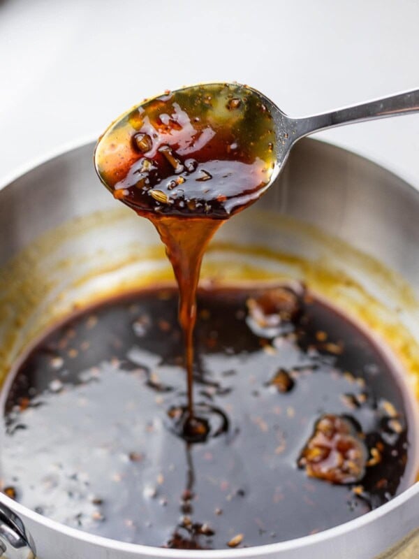 Sweet and tangy soy glaze on a spoon