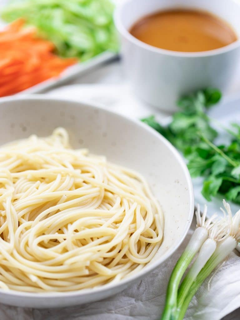 spaghetti noodles, scallions, thai peanut sauce