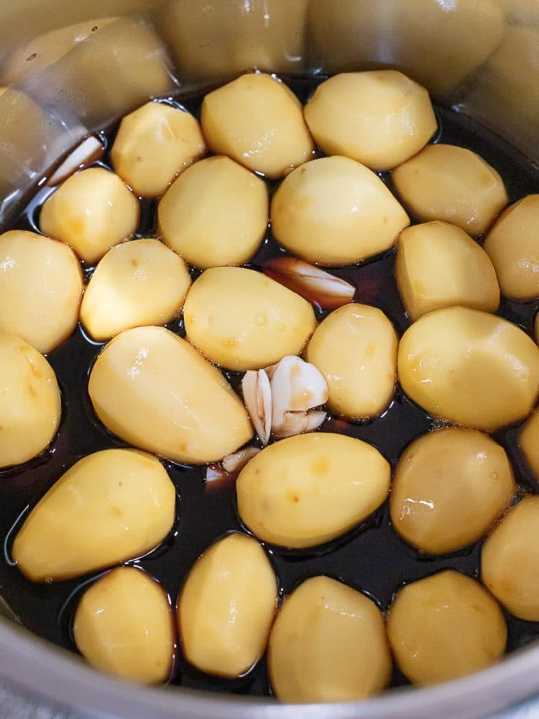 Potatoes in soy sauce inside an instant pot