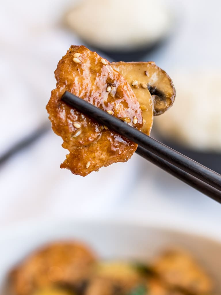 panda express mushroom chicken stir fry with chopsticks