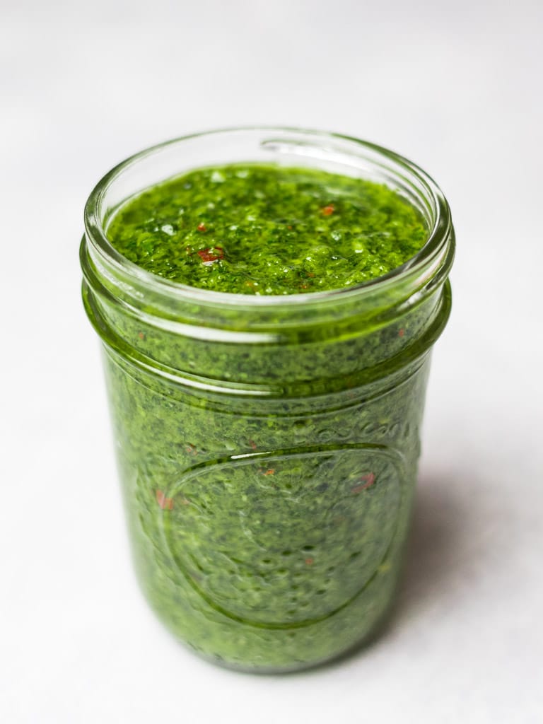 Asian chimichurri sauce in a glass mason jar
