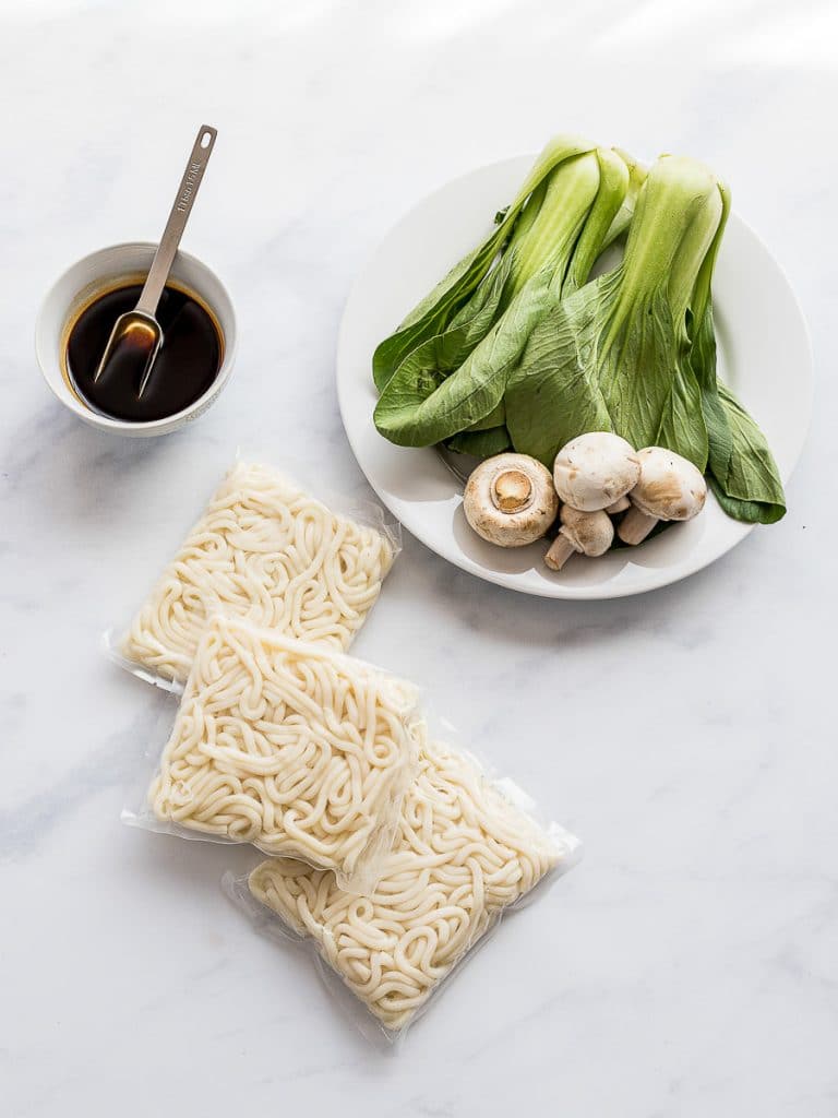 udon noodles, mushrooms, bok choy, and udon noodle sauce