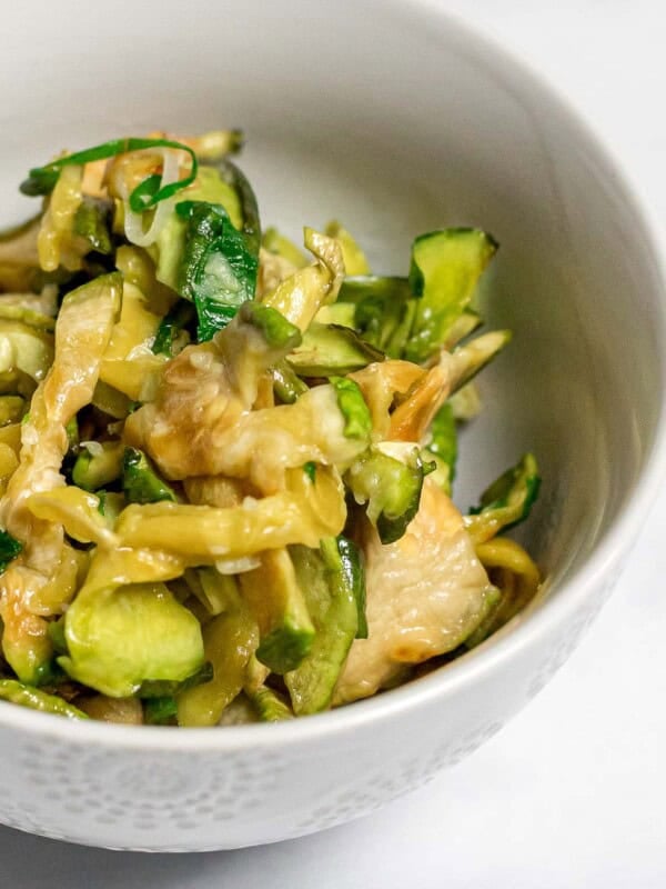 closeup of Korean dried zucchini side dish in a small white bowl