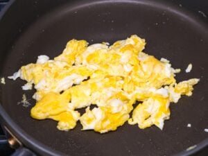 scrambled eggs in a nonstick pan