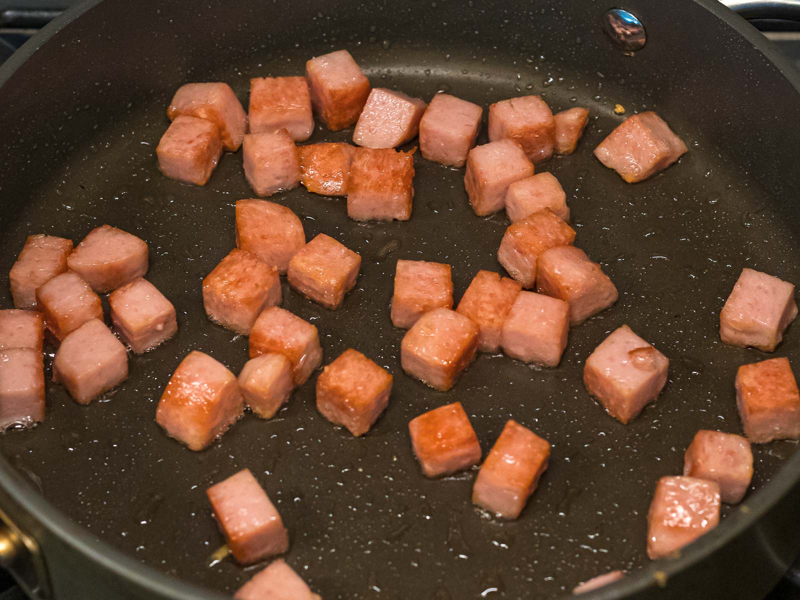 spam cubes fried in a nonstick pan