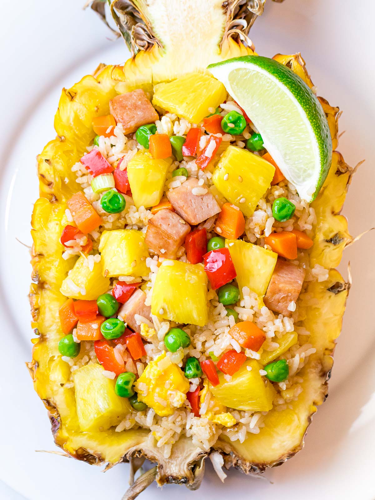 Hawaiian pineapple fried rice with spam in a pineapple boat