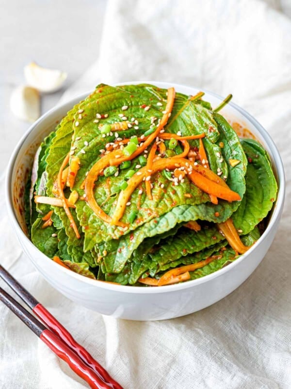 Korean perilla leaf kimchi marinated in a spicy garlic soy sauce with shredded carrots