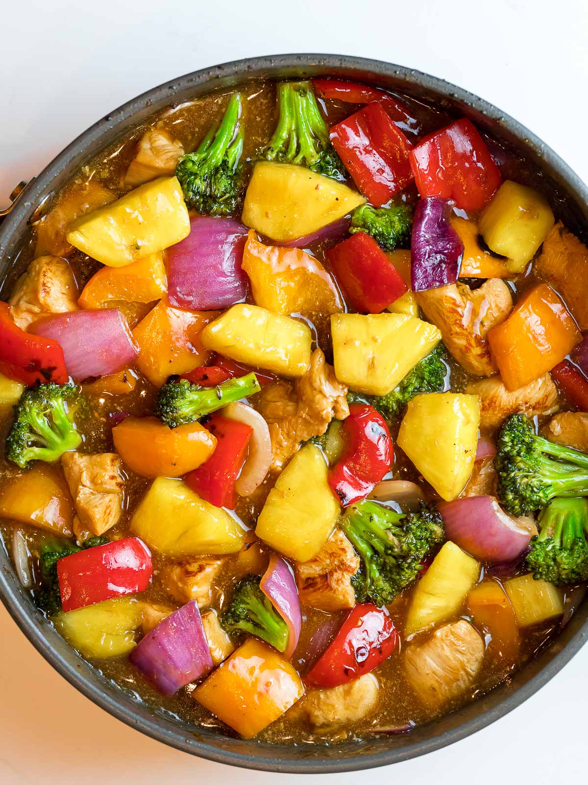 sweet and tangy pineapple chicken stir fry with pineapple teriyaki sauce