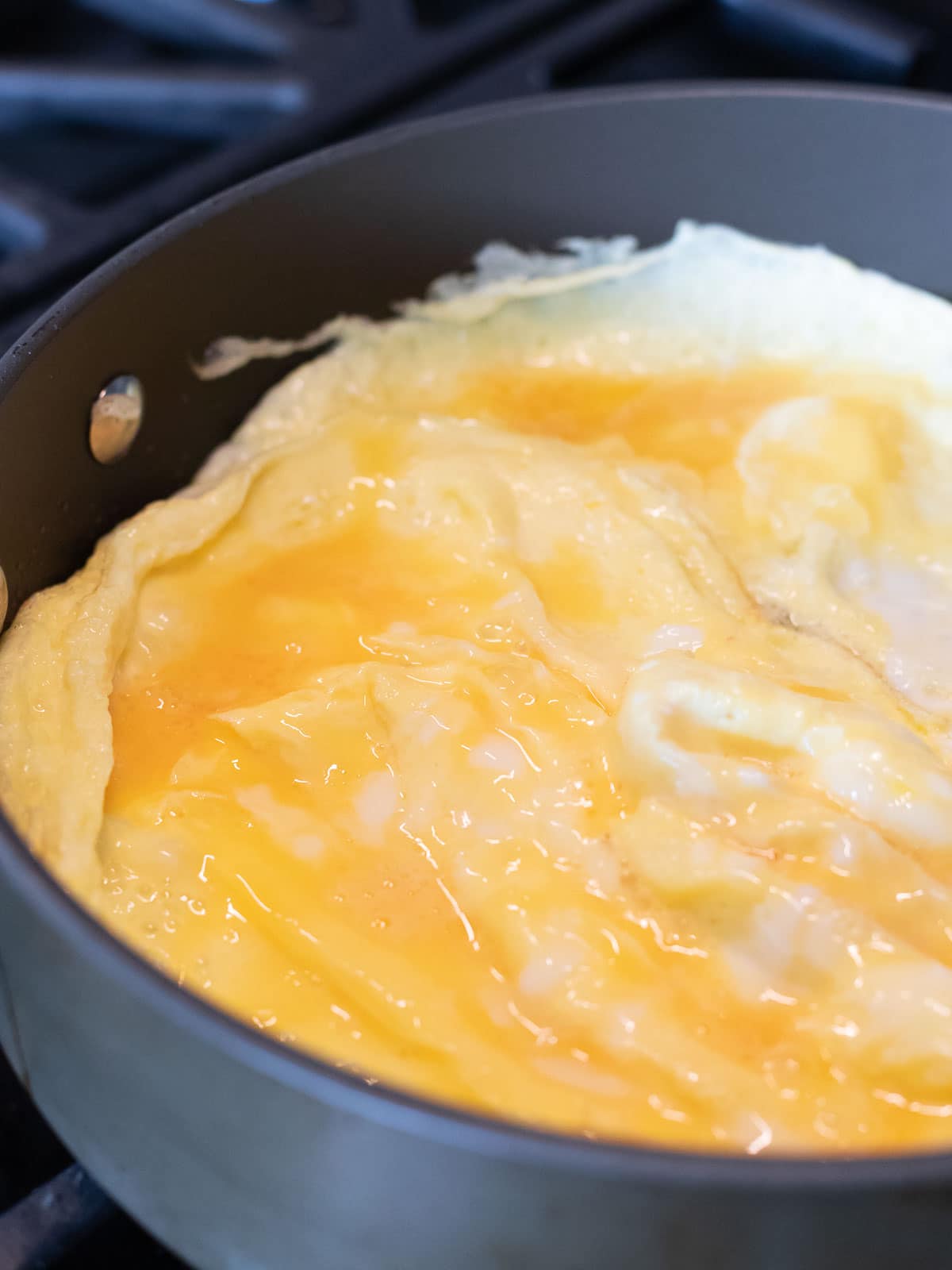 eggs cooking in a nonstick pan