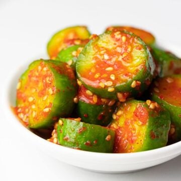 spicy Korean cucumber salad (Oi Muchim) with sesame seeds, oi muchim