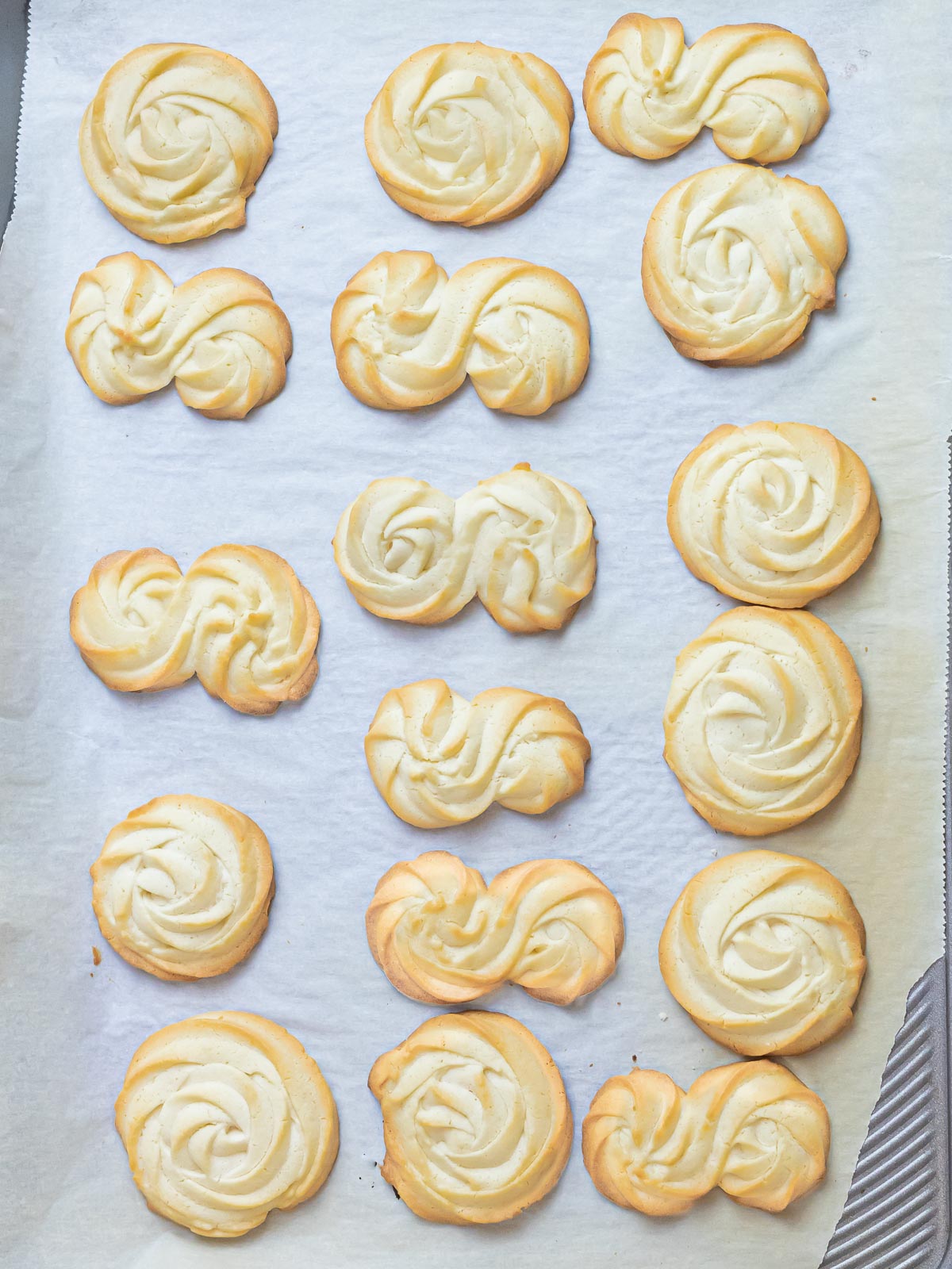 butter cookies baked on parchment paper
