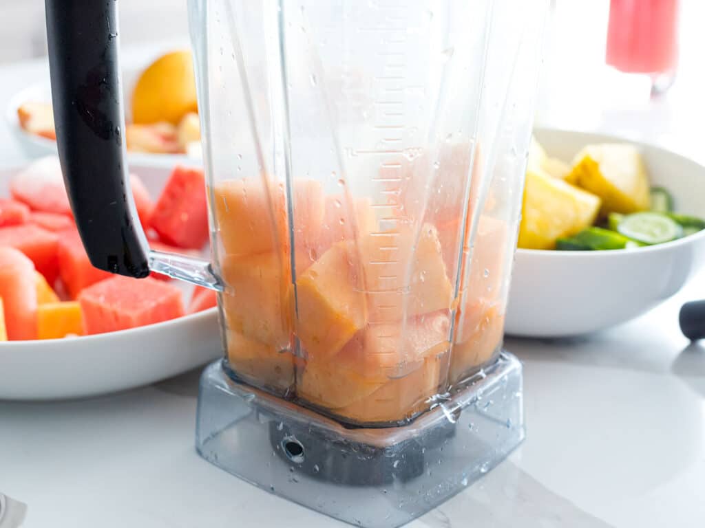 cantaloupe pieces in a blender