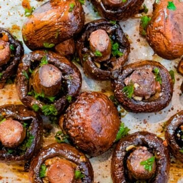 overhead of whole oven roasted mushrooms with garlic and balsamic vinegar