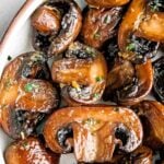 easy sauteed mushrooms text with a photo of mushrooms