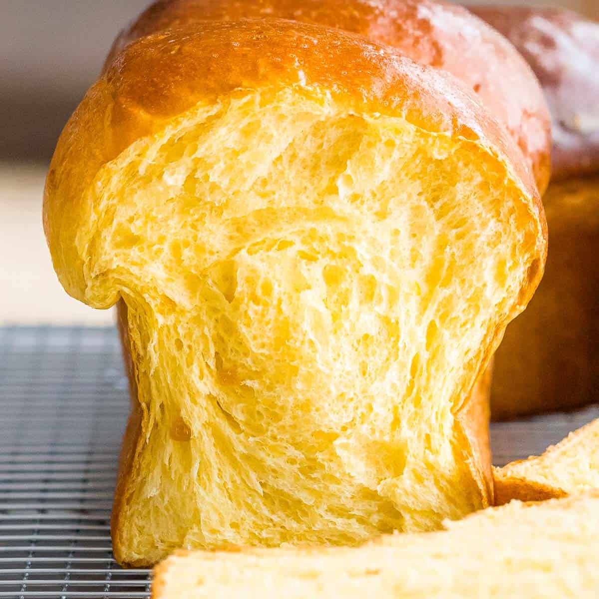 Pumpkin sourdough bread with soft, fluffy interior and golden brown crust.