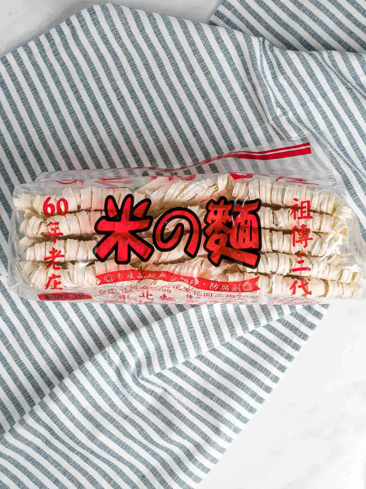 Wide Chinese ribbon noodles called 刀削面 Dao Xiao Mian in packaging.