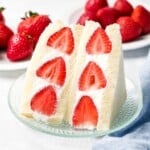 Japanese fruit sandwich or strawberry sando made with fluffy whipped cream, red strawberries, and Japanese milk bread.
