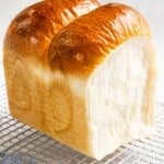 Soft and fluffy milk bread (shokupan) with golden crust.