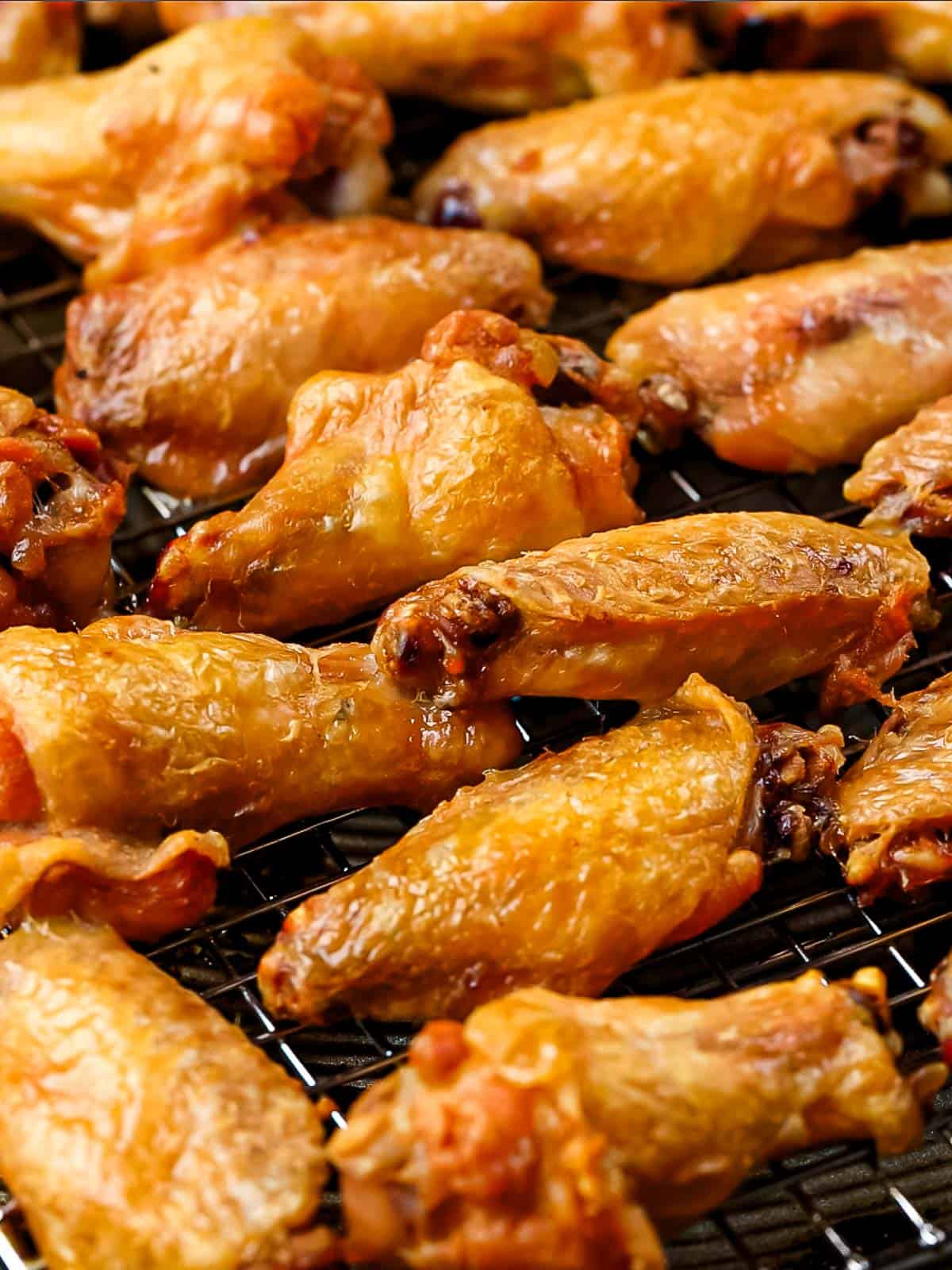 Crispy oven baked chicken wings with golden brown crispy skin.