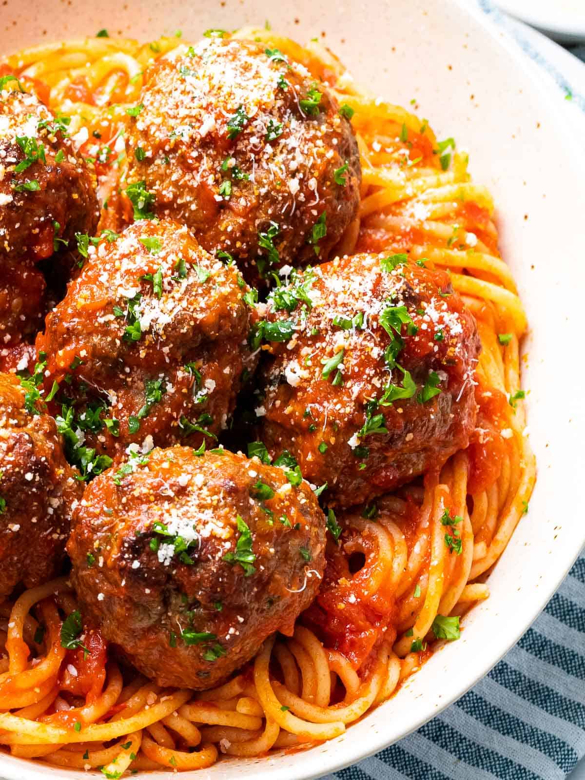 Juicy, melt in your mouth Italian meatballs with spaghetti.