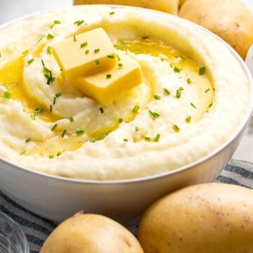 Sour cream mashed potatoes with chives and butter.