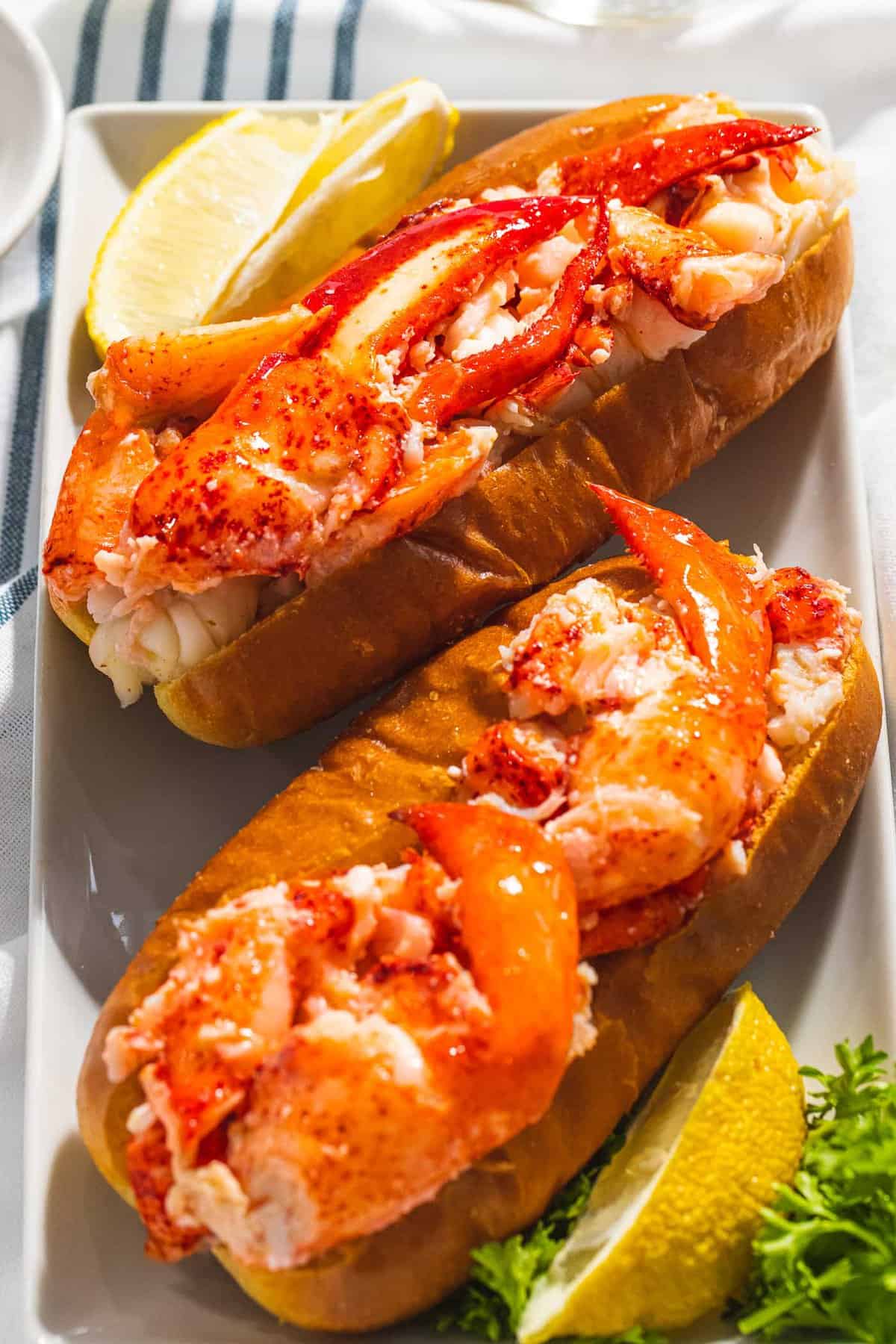 Connecticut lobster roll with claw meat on a hot dog bun.