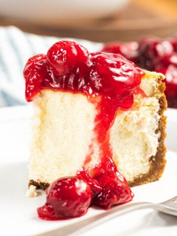 Creamy cheesecake with cherry topping.