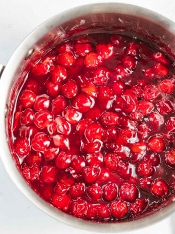 Cherry pie filling made with sour pie cherries in a pot.