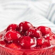 Easy cherry topping with text overlay.