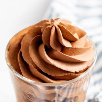 Chocolate whipped cream piped in a cup.