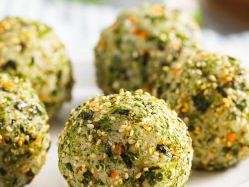 Korean rice balls covered with seaweed and sesame seeds.