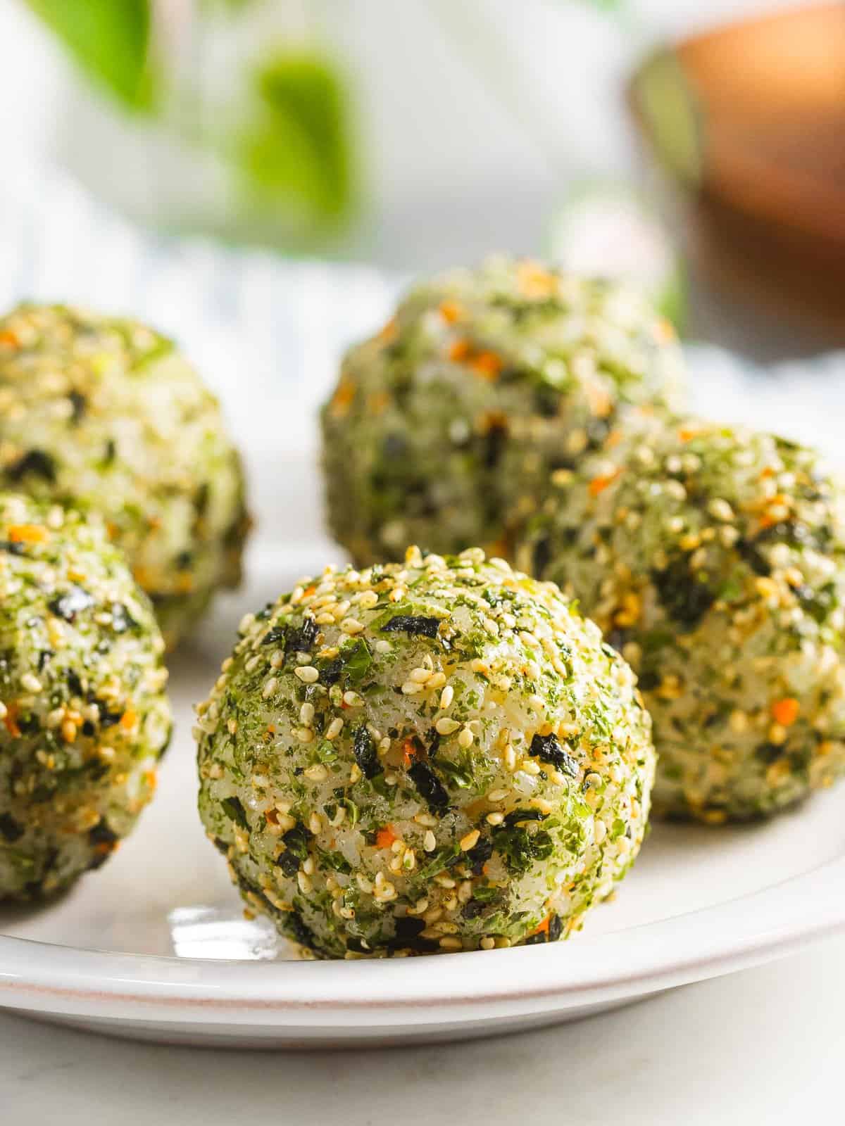 Korean rice balls covered with seaweed and sesame seeds.