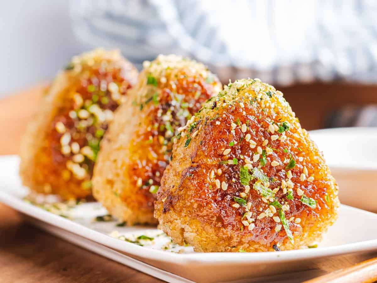 Yaki onigiri with a golden-brown, crispy crust covered with furikake.