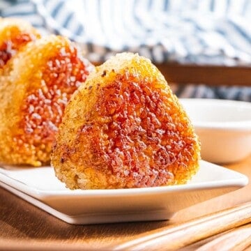Yaki onigiri or grilled rice balls seasoned with soy sauce and grilled until crispy.