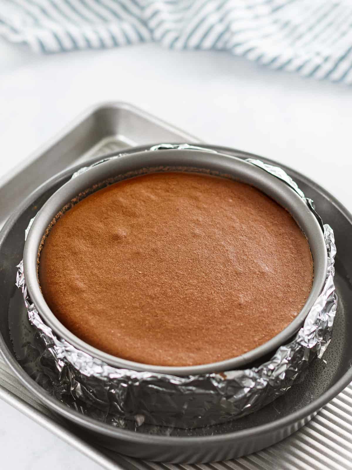 Crack-free chocolate cheesecake in a springform pan and water bath.