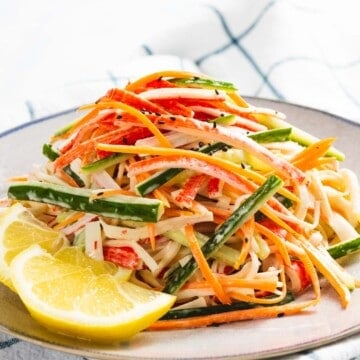 Kani salad made with crab stick, cucumber, and carrot tossed in a mayo dressing.
