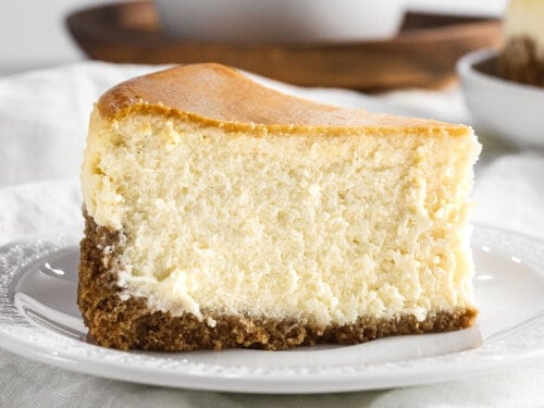 Classic New York style cheesecake on a plate.