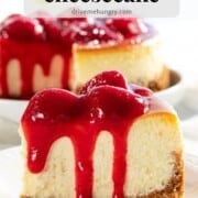 A slice of strawberry cheesecake with strawberry sauce.