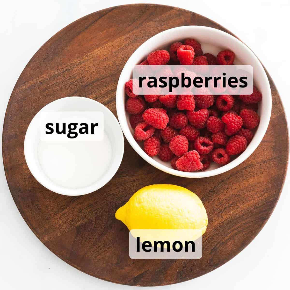 Ingredients for raspberry sauce with text overlay.