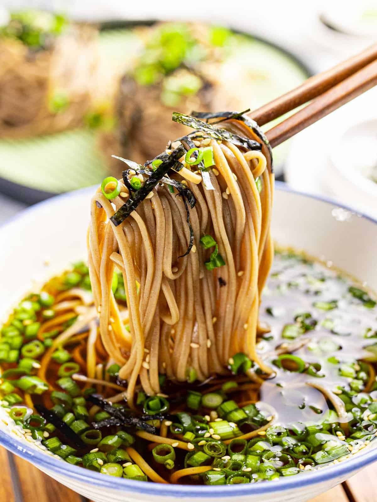 Zaru soba or cold soba noodles dipped into tsuyu dipping sauce.