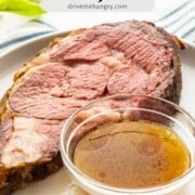 Prime rib au jus with text overlay.