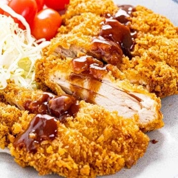Chicken katsu coated with panko breadcrumbs and topped with katsu sauce.