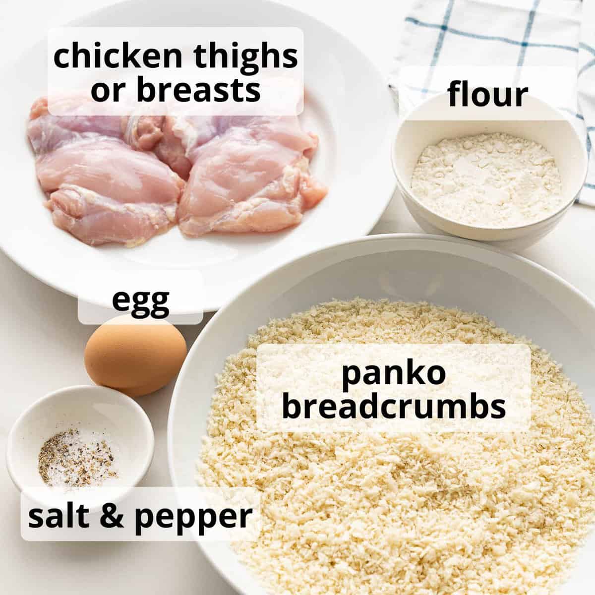 Ingredients for chicken katsu including panko breadcrumbs, chicken, flour, and egg.