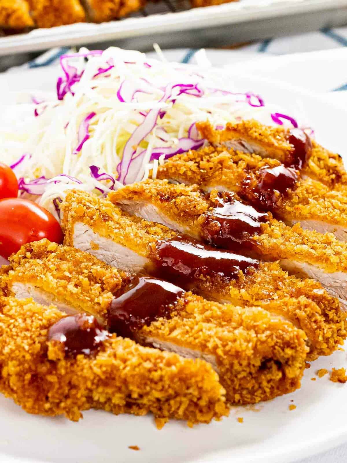 The crispiest tonkatsu with a thick layer of crispy panko breadcrumbs fried until golden brown.