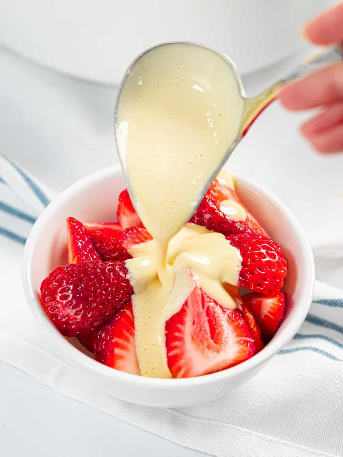 Creamy zabaglione sauce with fresh strawberries.