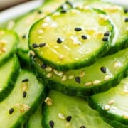 Sunomono or Japanese cucumber salad with sesame seeds.