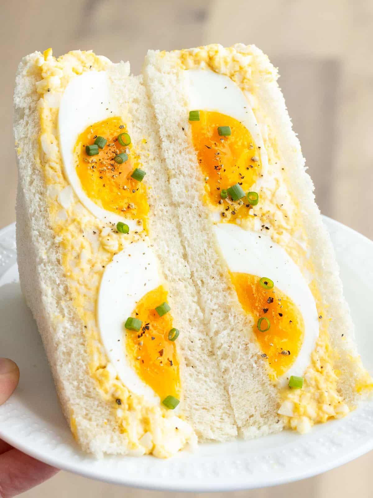 Japanese egg sandwich or tamago sando on a plate.